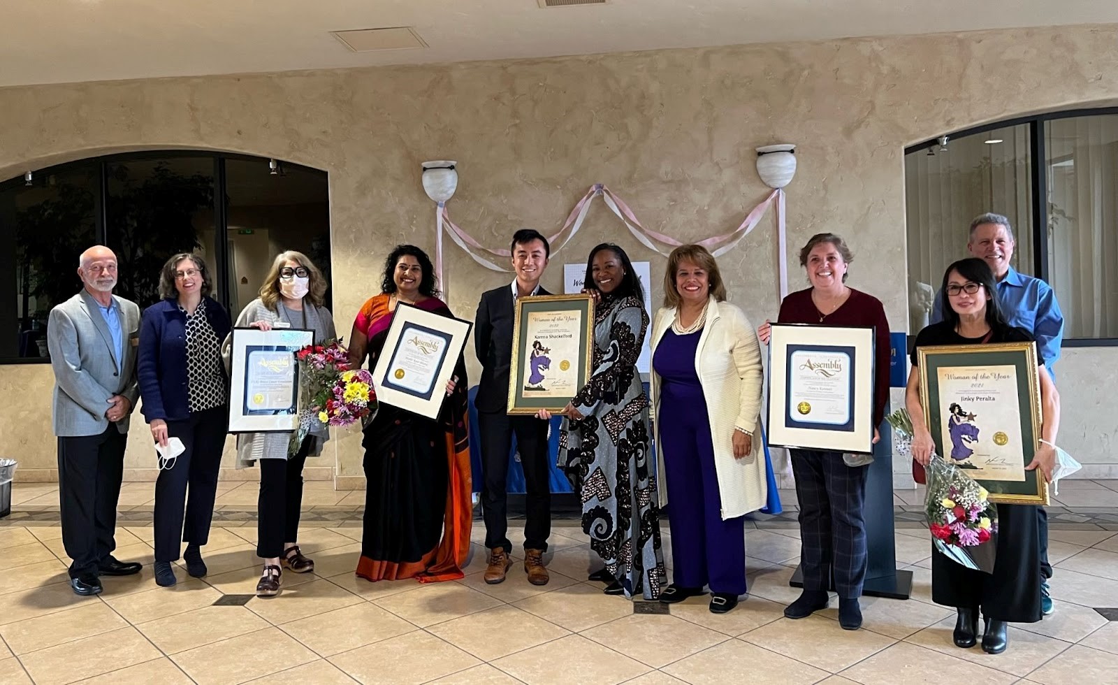 Awardees standing with awards