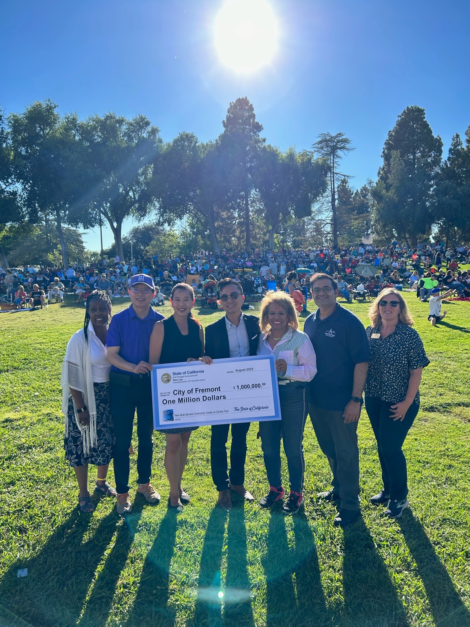 Assemblymember Alex Lee presents a ceremonial check of $1 million in state funding for Fremont's multi-use community center at Central Park