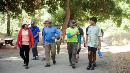 Participants of the Community Walk and Talk event hike along the Penitencia Creek trail.