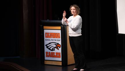 Photo of Sign Language Interpreter on stage