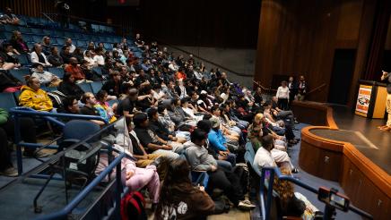 Students and guests at the bill signing event