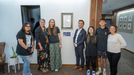 Asm. Lee photo with students and interpreters